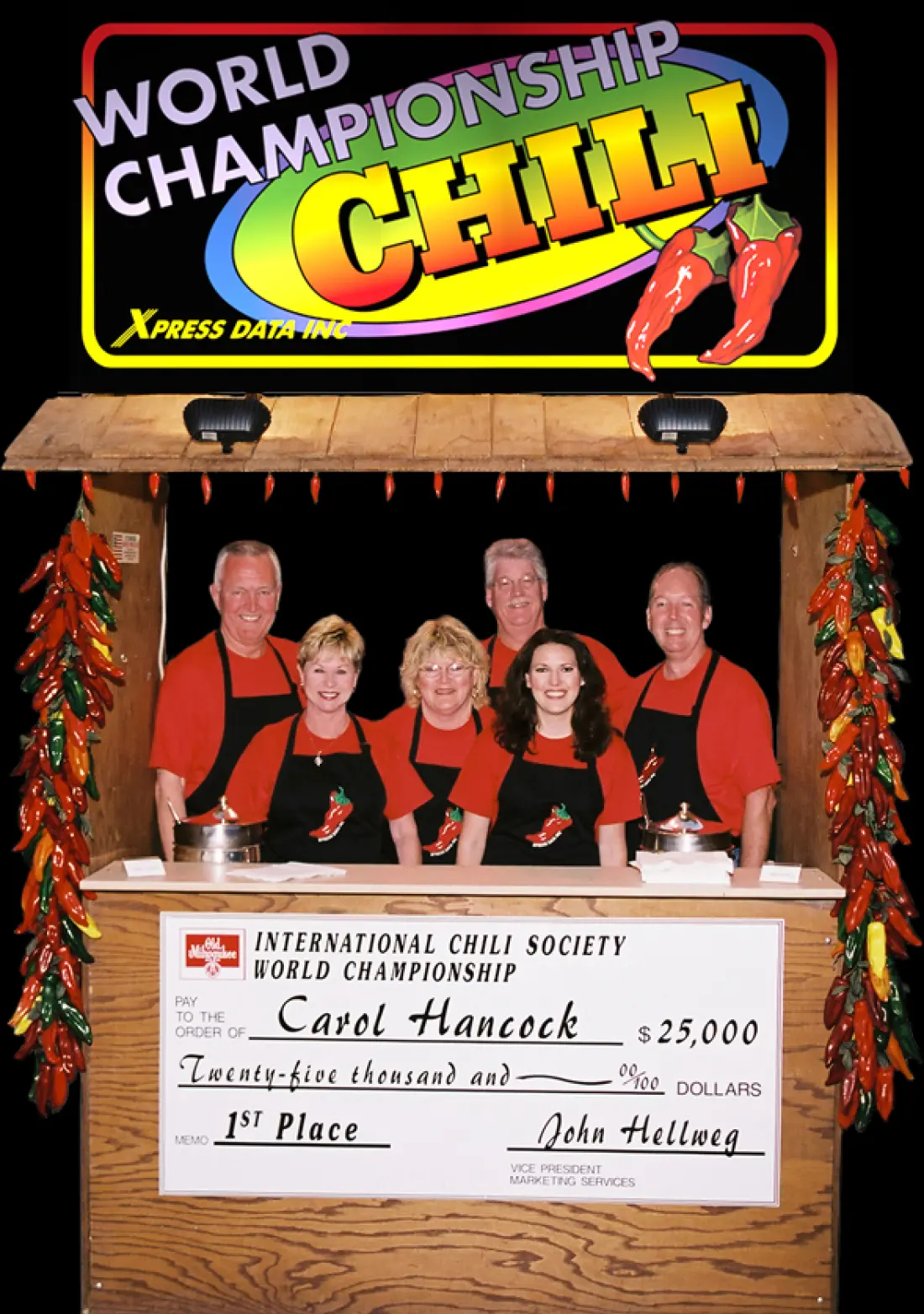 Photo of the original team behind their chili stand at the world championship.